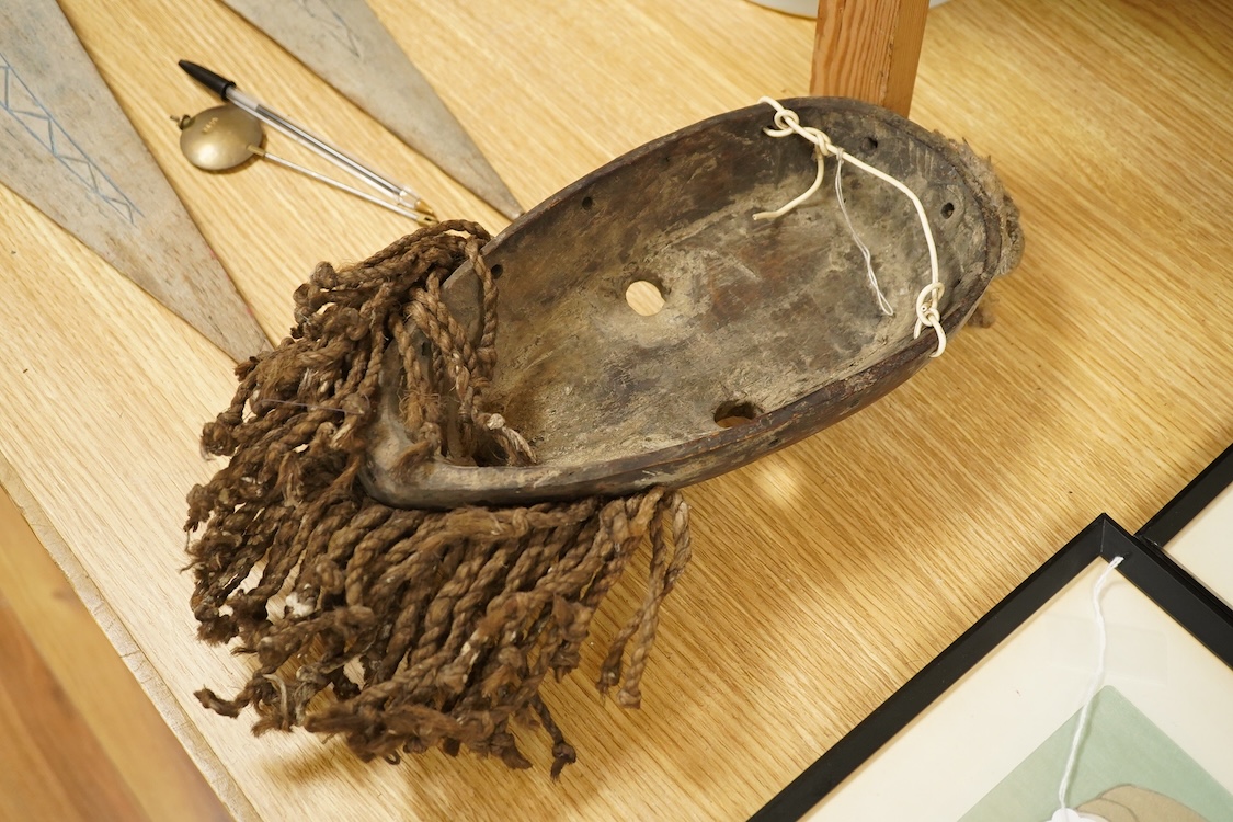 African tribal art interest; a hardwood Dan mask, 37cm